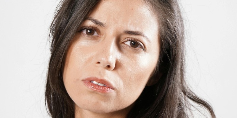A woman making thoughtful decisions